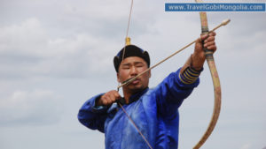 Mongolian archery is aiming the target during Naadam Festival in Ulaanbaatar