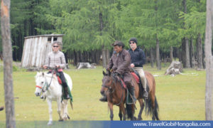 our guide & our customer are riding horse in Khuvsgul Lake